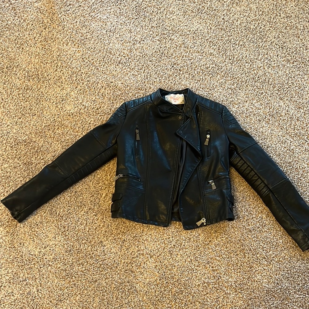 Black moto-jacket. Purchased in Frace, worn one or two times. Too small now.
